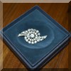 J23. Rhinestone brooch. 